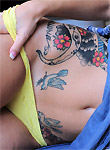 Ivy Snow pics yellow top tattoos