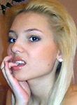 Petite blonde teen gets topless - pics