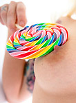Lynn Pops sucks on a rainbow lolli pop! - pics